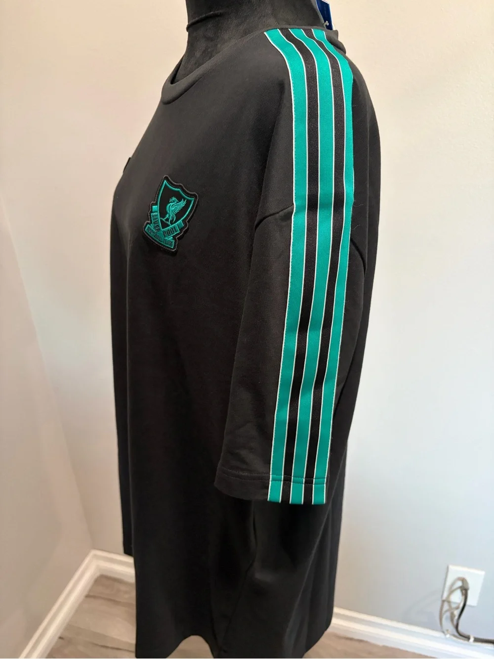Liver Pool Adidas Men’s Black Tee with Teal Accents